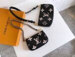 Louis-Vuitton-Multi-Pochette-Empreinte.png