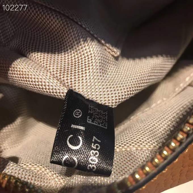 4br4GFZeR0LC8wC2bjd9LhMbkdlXbrz9VR3FXoyZ_lg.jpeg Gucci Soho Leather Disco Bag