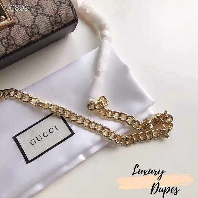 s75Sr0YoSR3YQ4HgX6DWLxwJKWdWTcI2UEvbWn9d_lg-1-1.jpeg Padlock Small GG Shoulder Bag